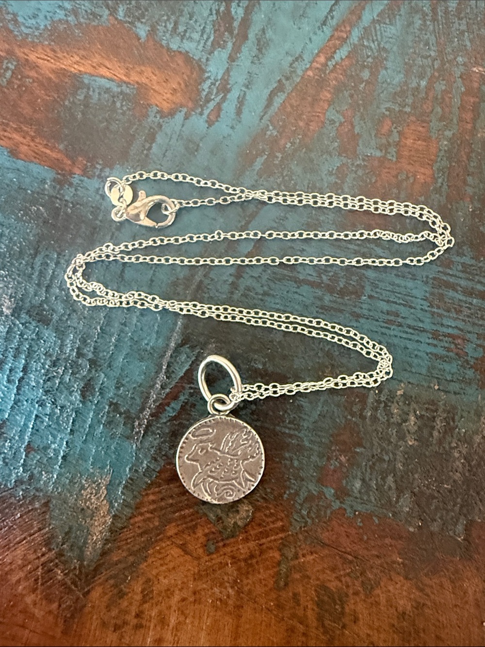 Jes MaHarry unisex ”Angel Dog” silver charm on 20” silver chain.